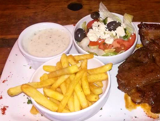 Steak, chips and salad
